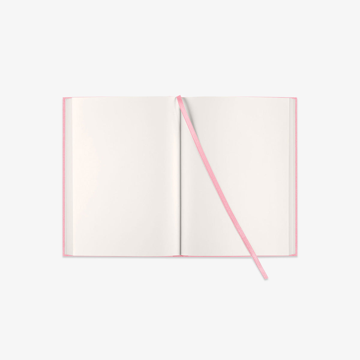 Open book with pink ribbon on a white background