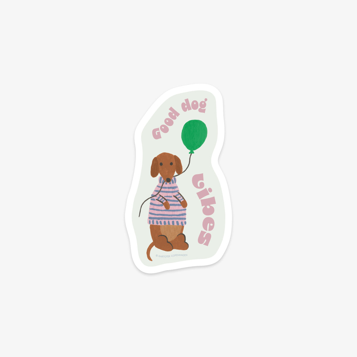 Vinyl sticker with a dog holding a green balloon and 'good dog vibes' text on a light green background