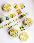 Set of colorful washi tape rolls with nature designs on a white background