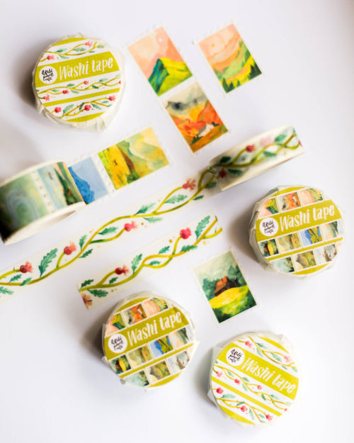 Set of colorful washi tape rolls with nature designs on a white background
