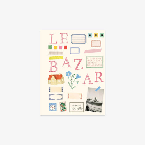 A sticker collection sheet titled 'LE BAZAAR' featuring various pastel-colored decorative labels, stamps, small illustrations of houses and flowers, and a vintage car photo, displayed on a light gray background.