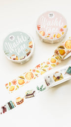 Two washi tape with colorful designs on a white surface