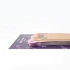 Stack of colorful grocery-kitten-shaped sticky notes on a white background