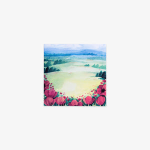 Sticky note with a watercolor design of pink flowers and a landscape on the cover
