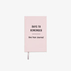 Pink journal titled 'Days to Remember: One Year Journal' on a white background
