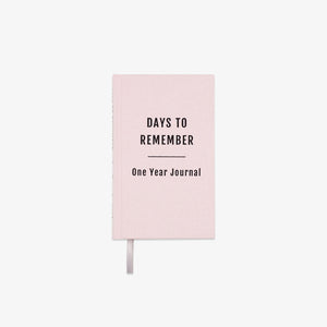Pink journal titled 'Days to Remember: One Year Journal' on a white background