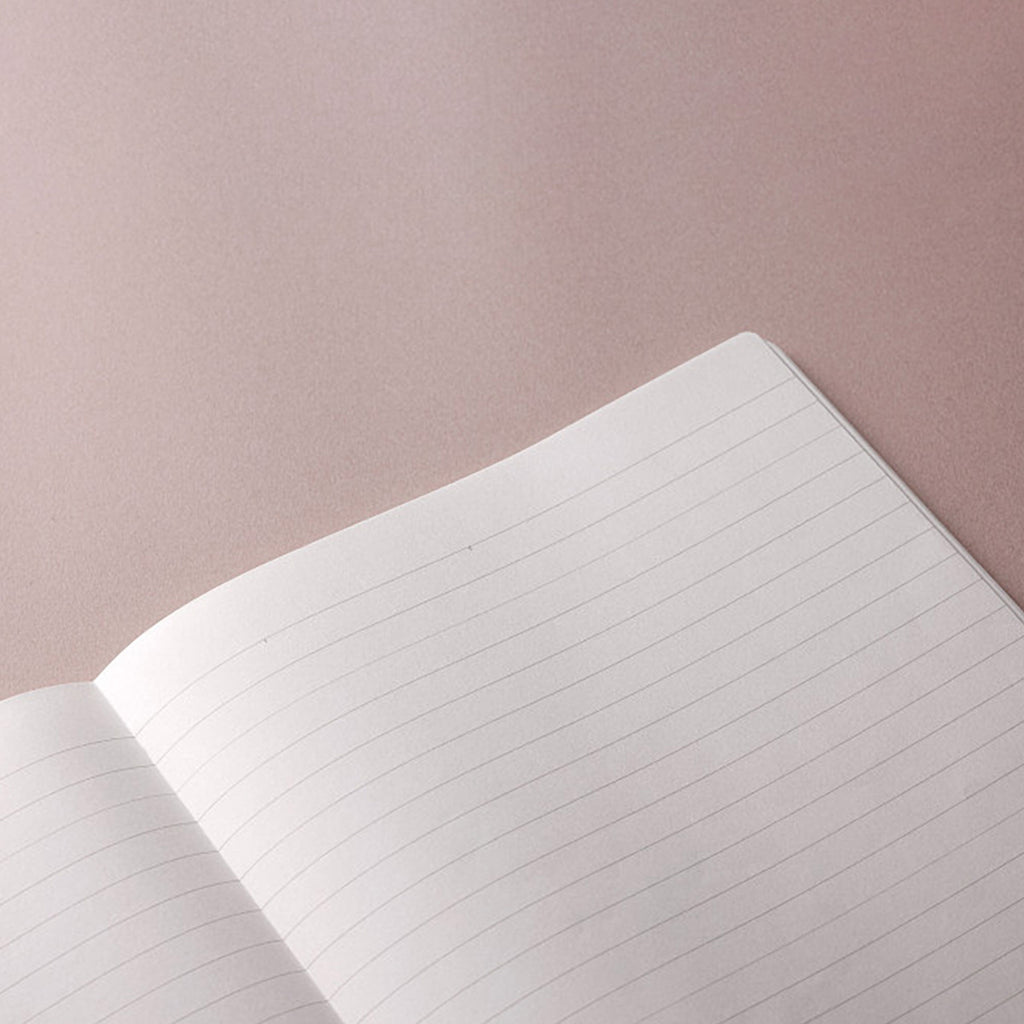 Open notebook with lined paper