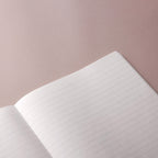 Open notebook with lined paper