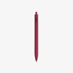 Red pen with a visible brand logo AND BLACK INK