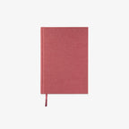Red notebook on a white background