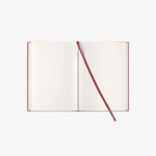 Open notebook with a red BOOKMARK on a white background