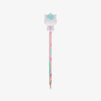 A pastel-colored pencil with a the back of a cute cartoon unicorn squishy character on top, set against a plain light gray background.