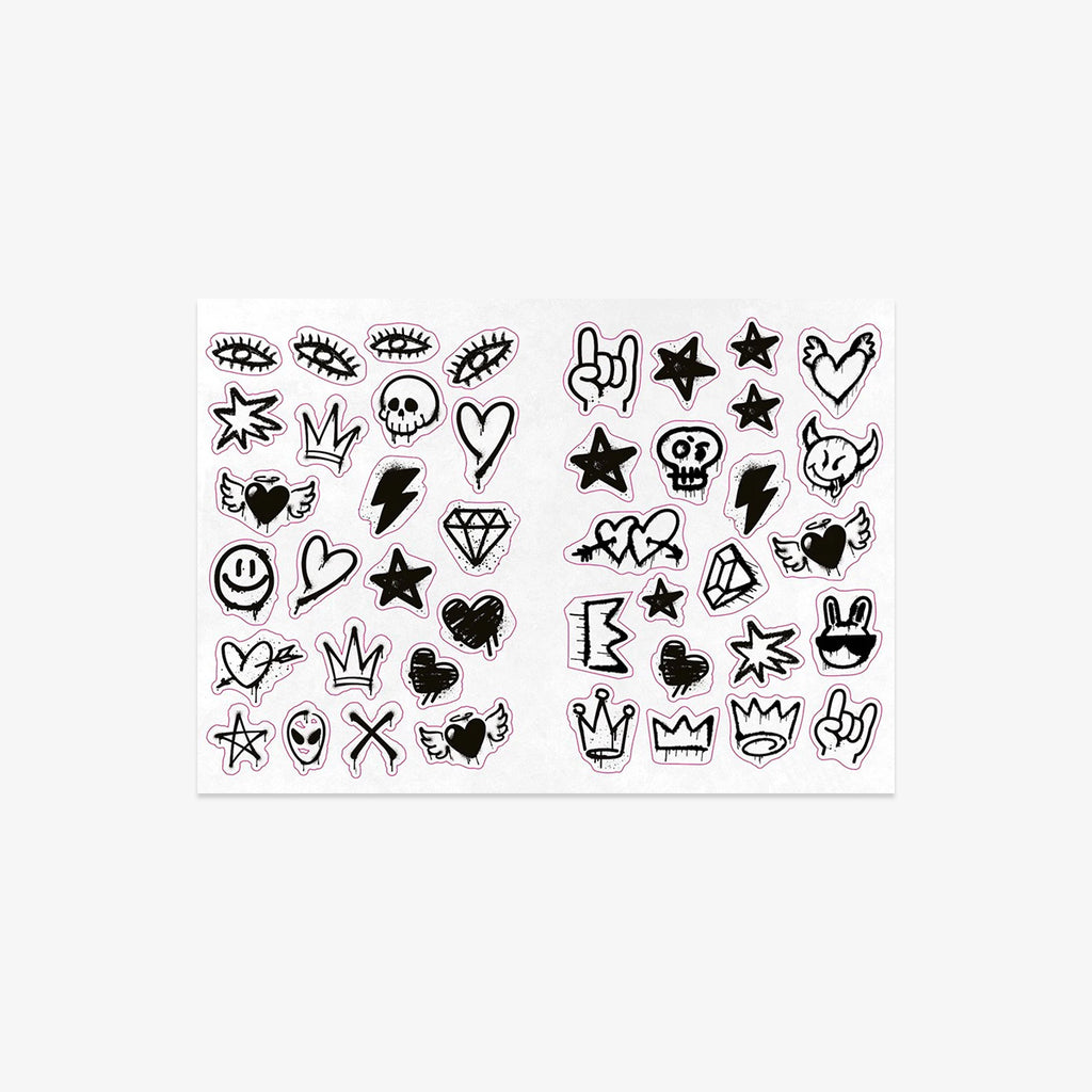 Sheet of black tattoo designs on a white background