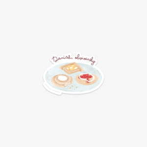 Vinyl sticker wit an illustration of a plate with Danish pastries on a white background with 'Danish, obviously' text.