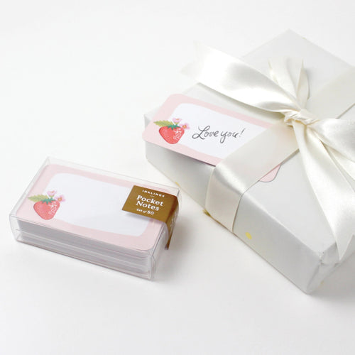 Pack of pocket notes with a decorative box on a white background
