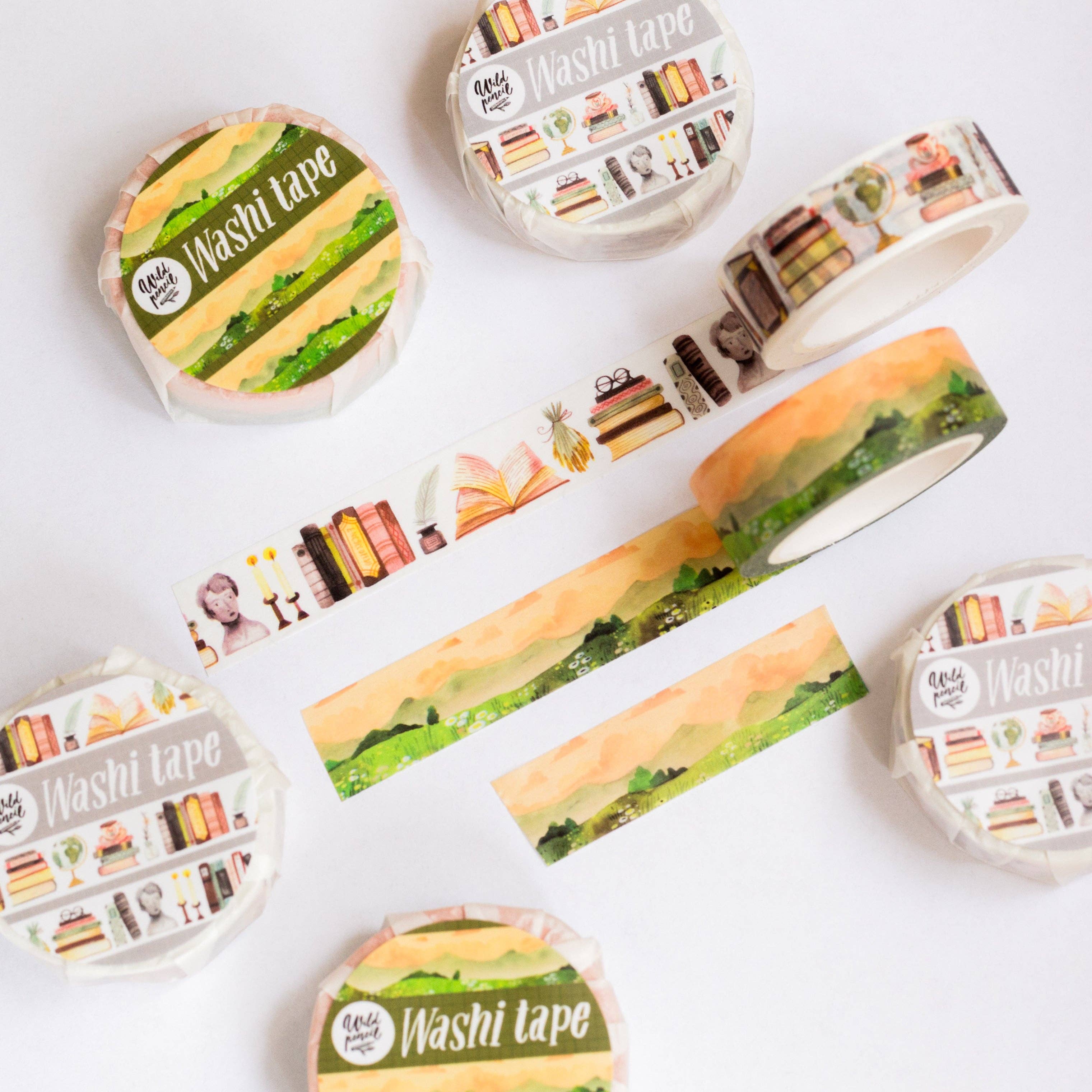 Washi tape rolls with various designs on a white background