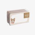 Box of pocket notes with a dog illustration on a white background