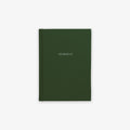 A green, hardcover cloth-bound notebook with the word 'JOURNEYS' printed on the cover in capital letters.